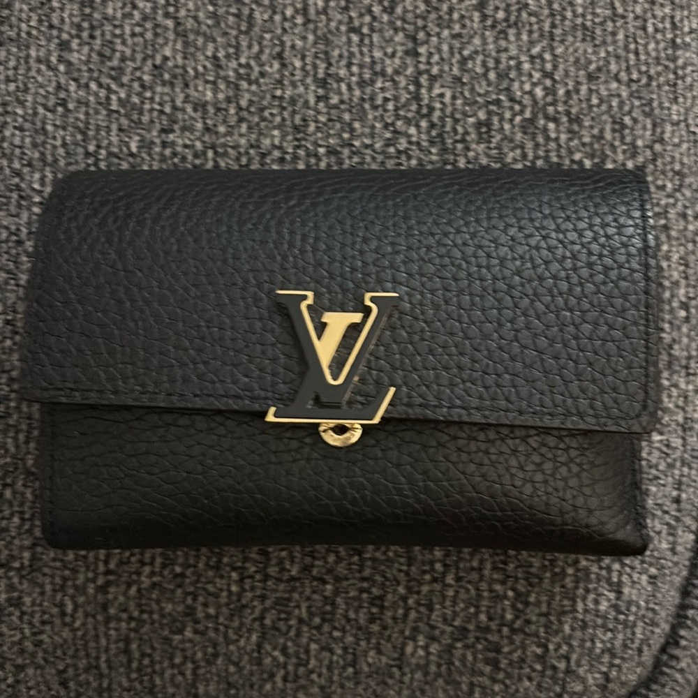 Authentic Louis Vuitton, wallet, black leather with hot pink interior